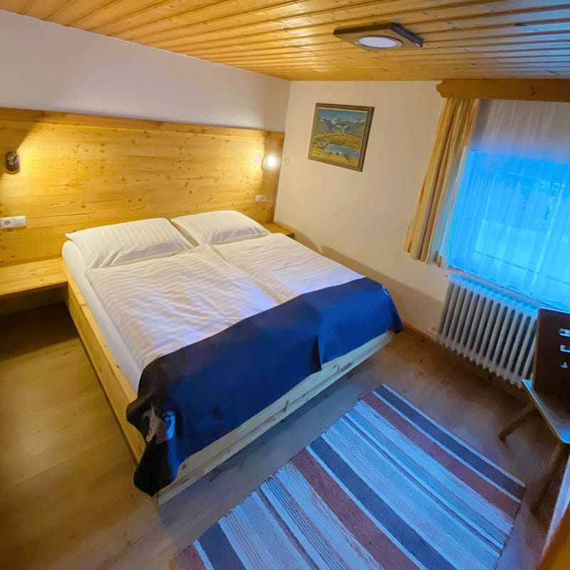 Schlafzimmer im Appartement 5 im Apart Berghof Steinbock